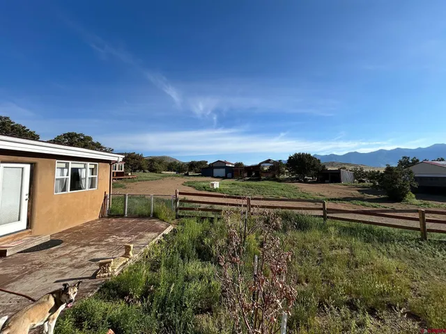 a view of house with outdoor space