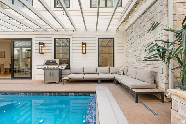 5354 Cyan Lane St. George, UT 84790 - Photo 10 of 45 Swimming pool featuring grilling area, a patio area, outdoor seating, and a pergola