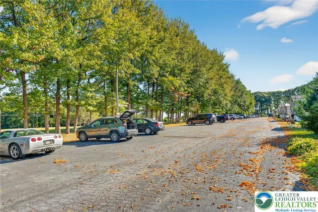 a view of car parked on the side of the road