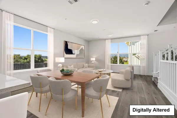 a bathroom with a sink toilet vanity and tub