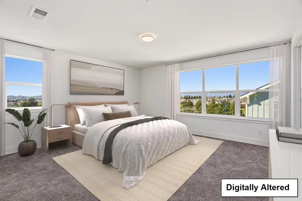 a bathroom with a sink toilet a mirror and shower