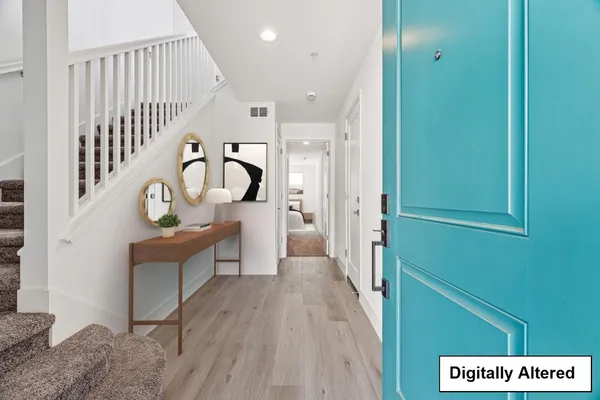 a kitchen with stainless steel appliances granite countertop a stove and a refrigerator