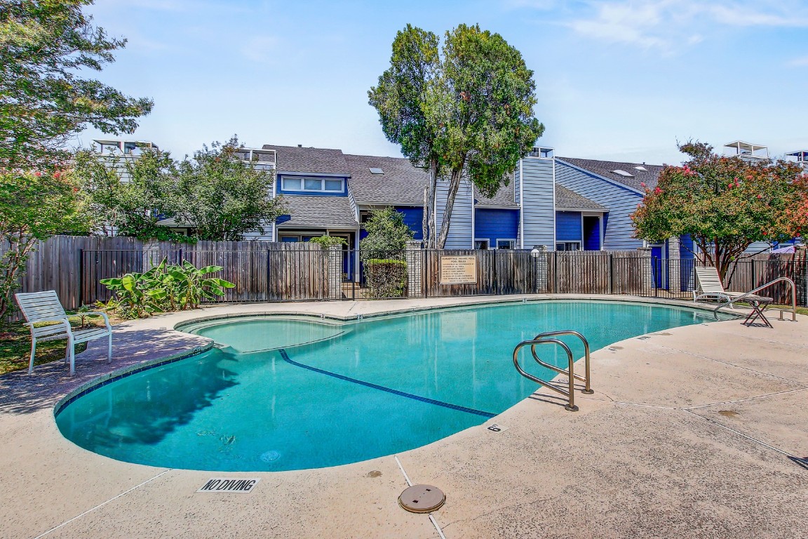 1010 West Rundberg Lane, Unit 24 Austin, TX 78758 - Photo 17 of 24 Community pool featuring a patio area