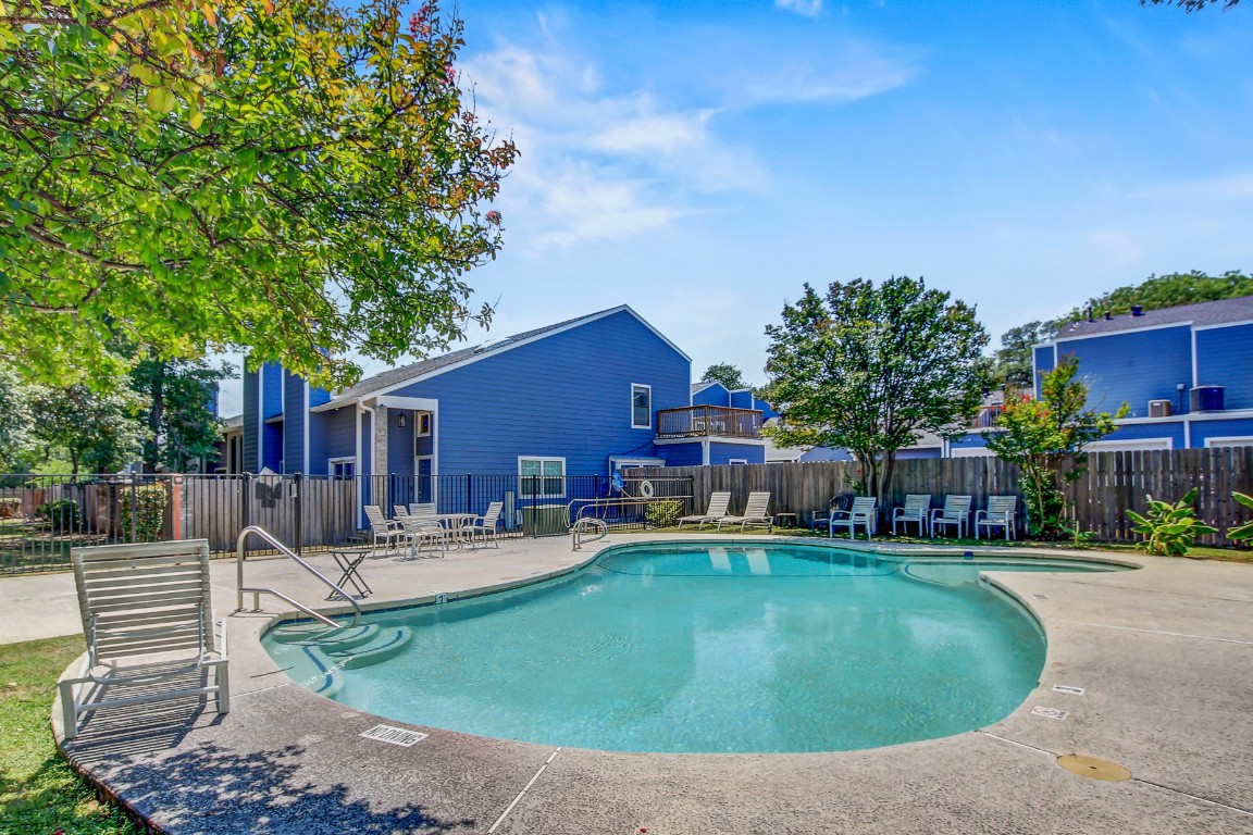 1010 West Rundberg Lane, Unit 24 Austin, TX 78758 - Photo 18 of 24 Community pool with a patio area