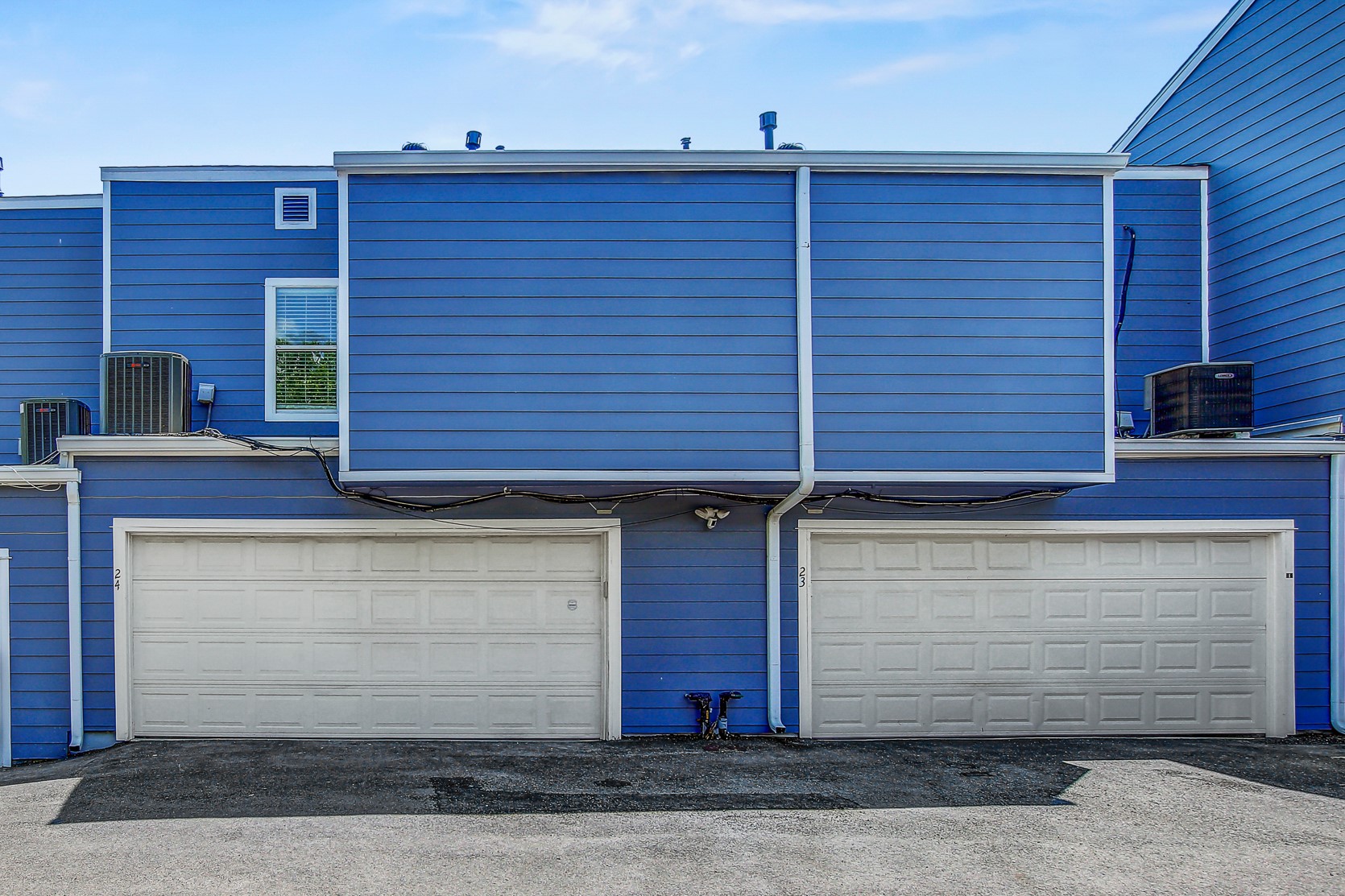 1010 West Rundberg Lane, Unit 24 Austin, TX 78758 - Photo 21 of 24 a front view of a house with a yard