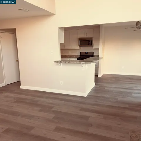 a view of kitchen and microwave