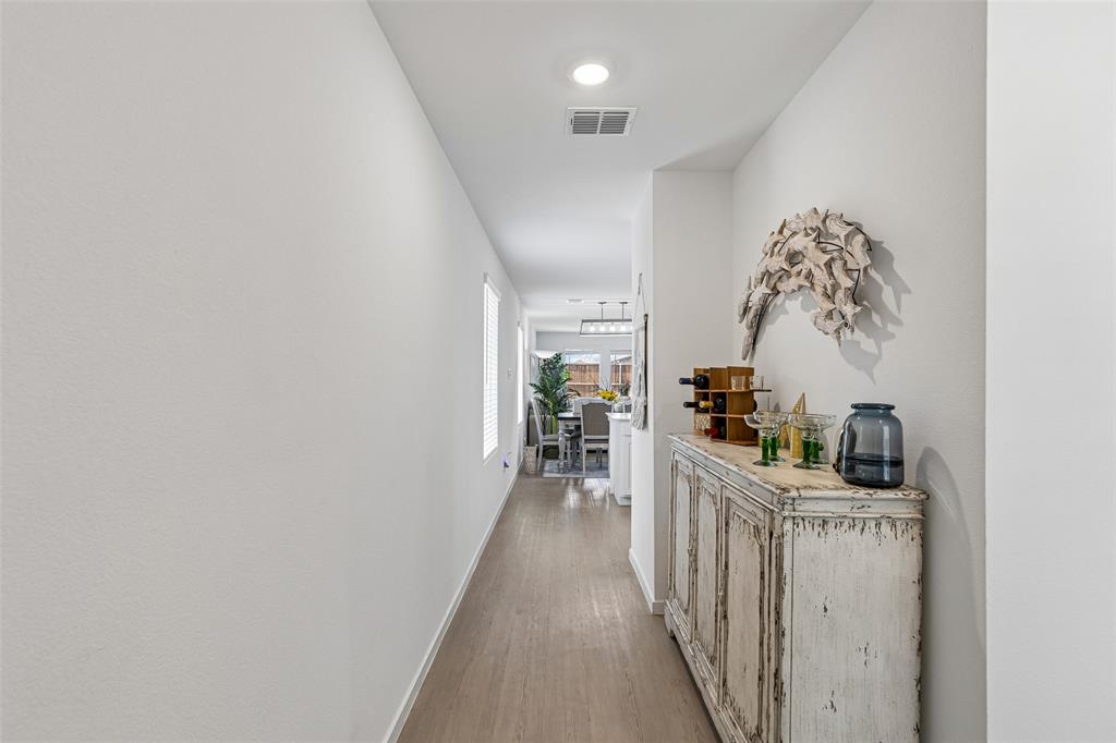 14163 Kempt Drive Pilot Point, TX 76258 - Photo 4 of 29 From the moment you walk through the front door, you'll appreciate the home's clean, modern design, abundant natural light, and open sightlines that create a warm and welcoming first impression.