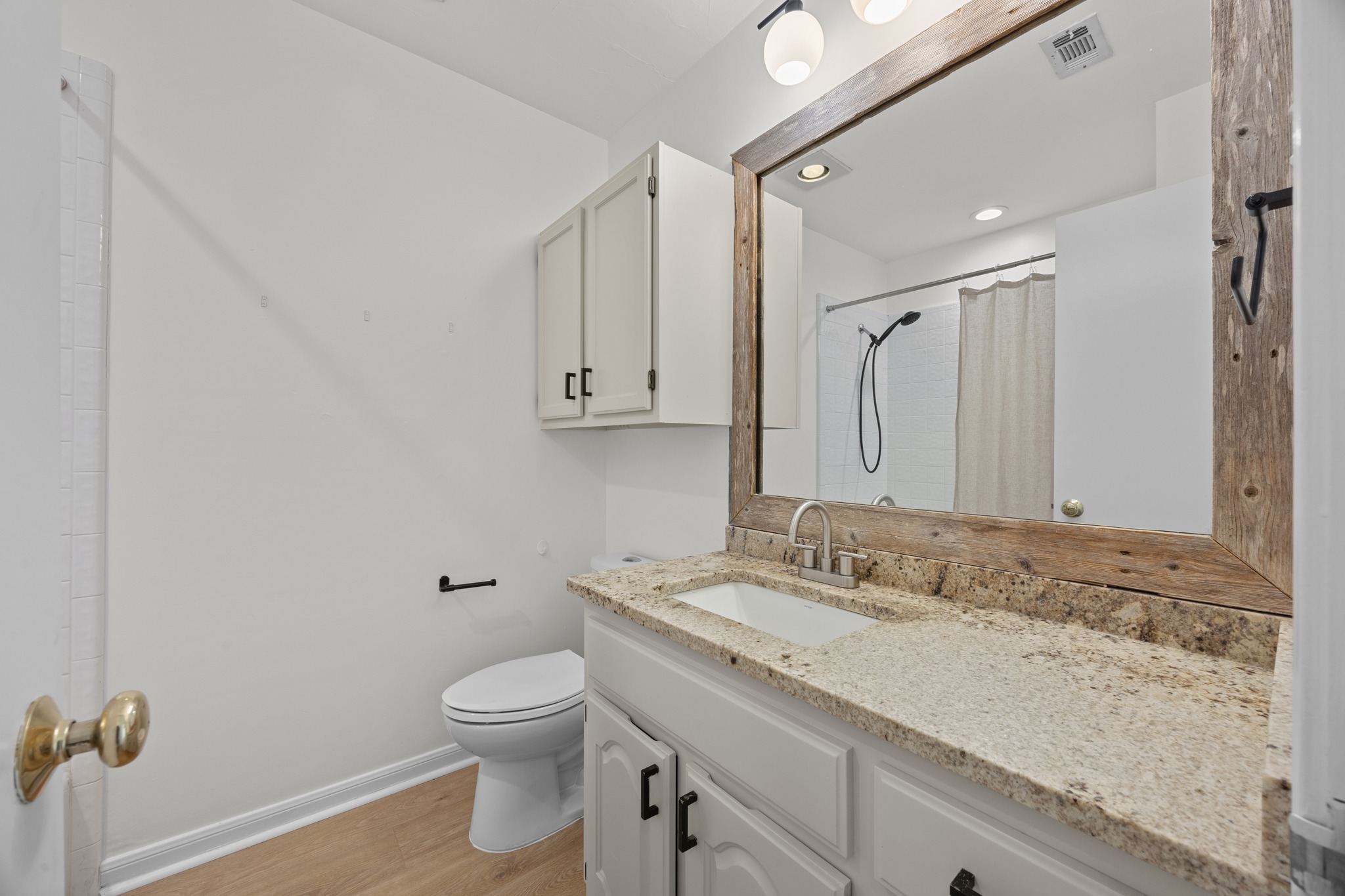 11019 Southwest Oaks Austin, TX 78737 - Photo 26 of 39 The second full bath features a spacious granite vanity.