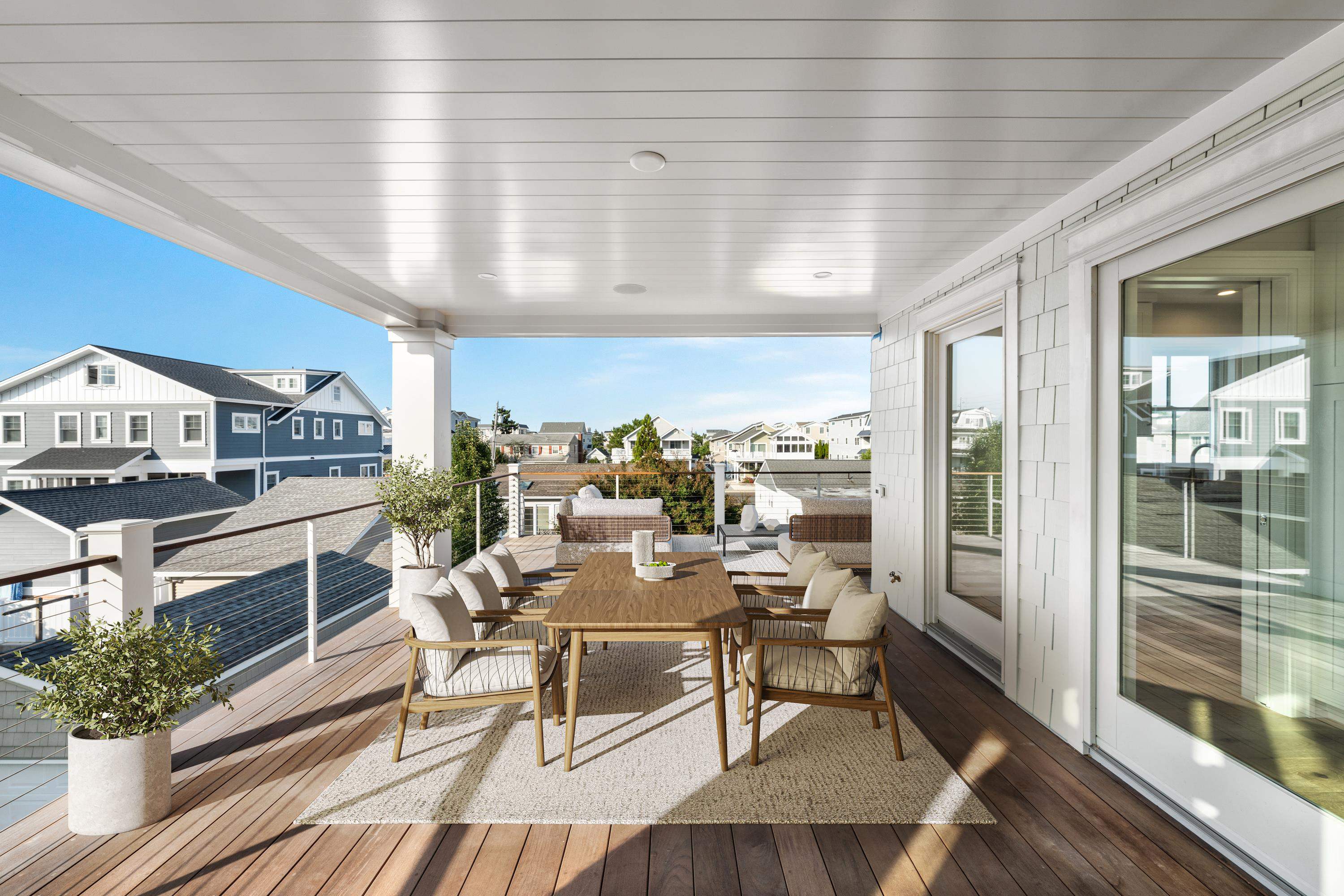 245 57th Street Avalon, NJ 08202 - Photo 11 of 50 a view of a dining room with furniture window and wooden floor
