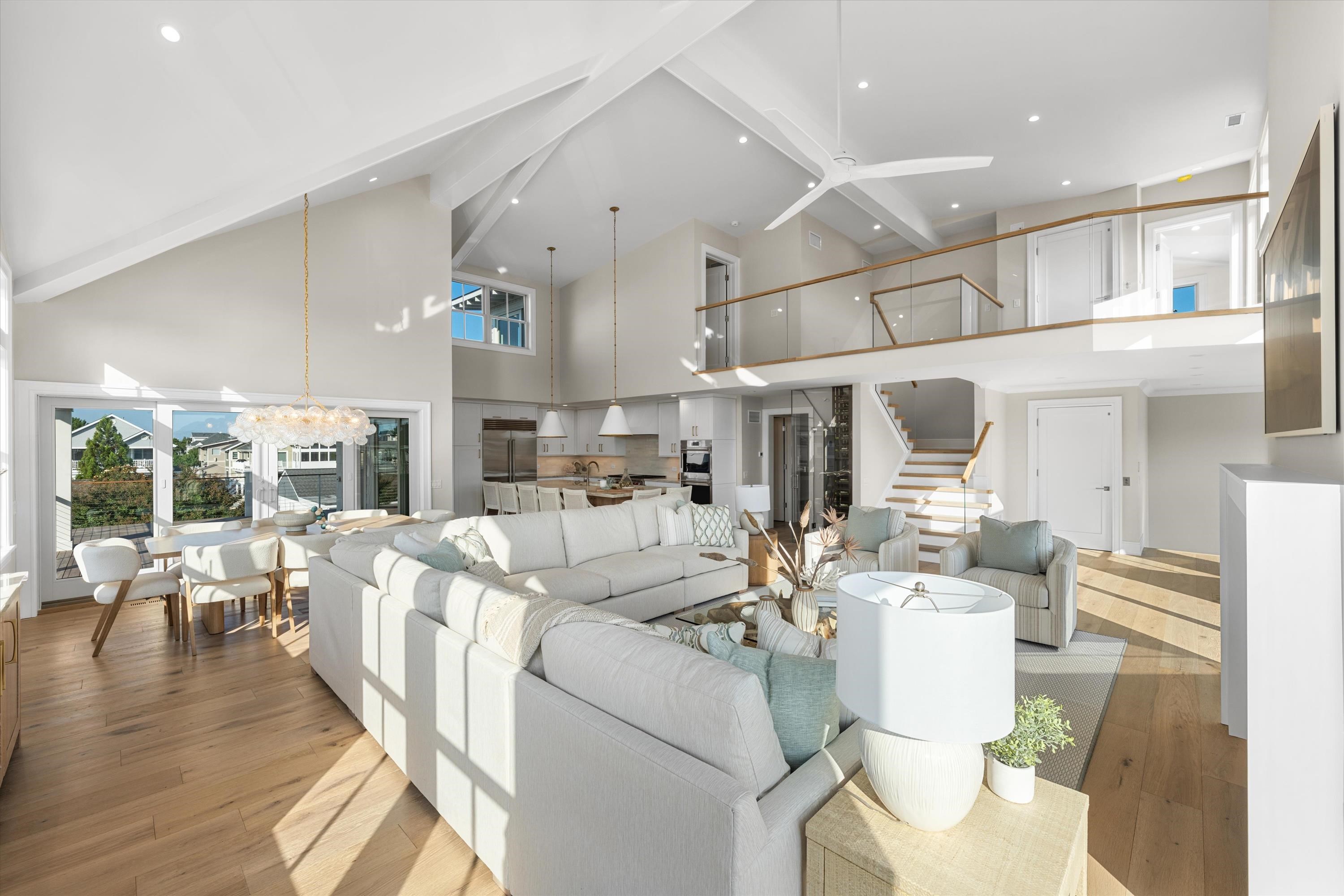 245 57th Street Avalon, NJ 08202 - Photo 12 of 50 a living room with furniture wooden floor and a large window