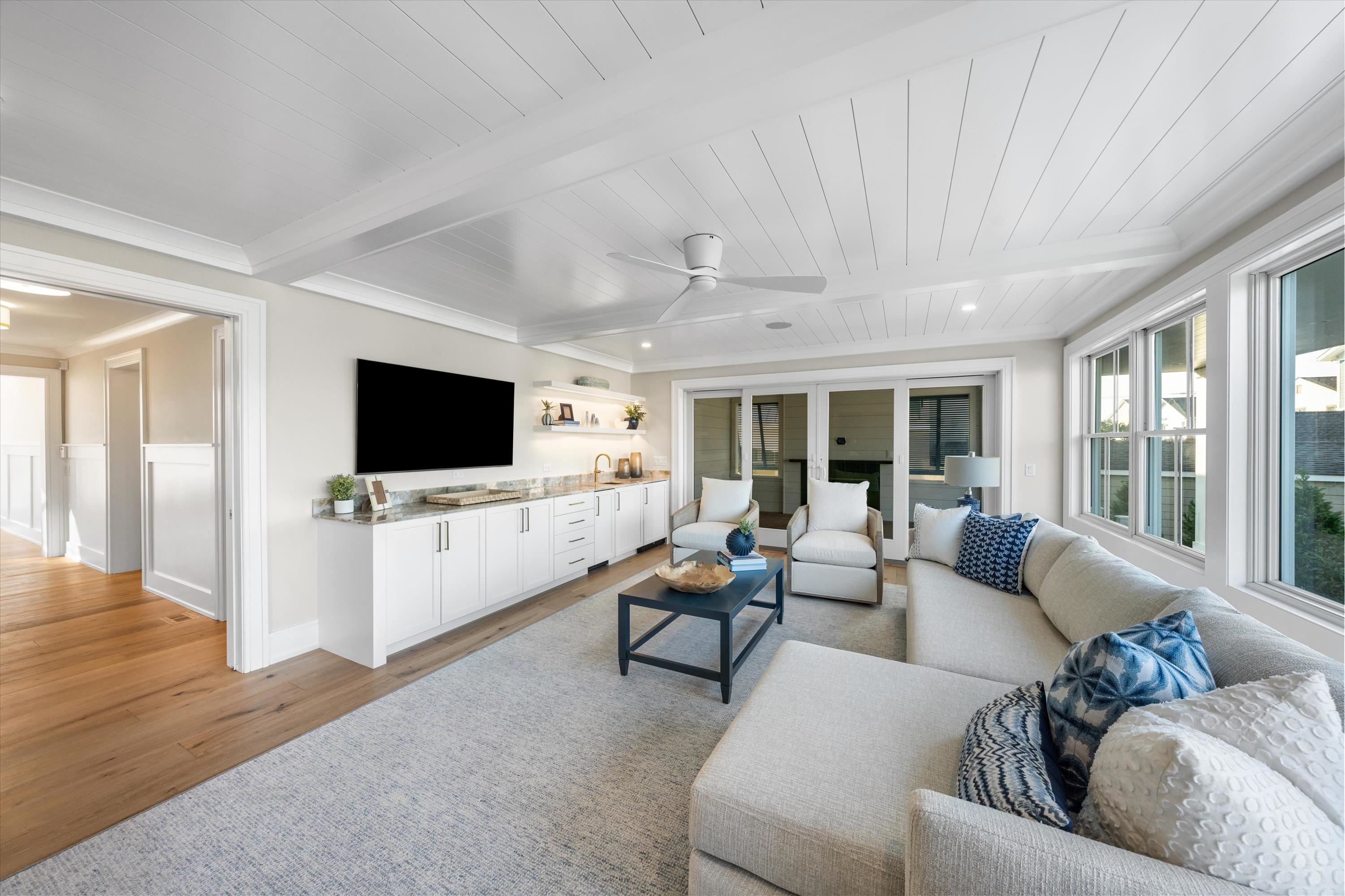 245 57th Street Avalon, NJ 08202 - Photo 21 of 50 a living room with furniture and a flat screen tv