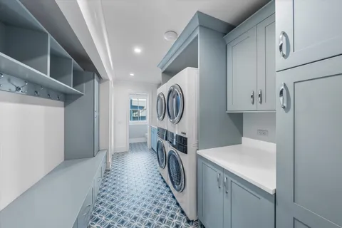 a spacious bedroom with a large bed and a window