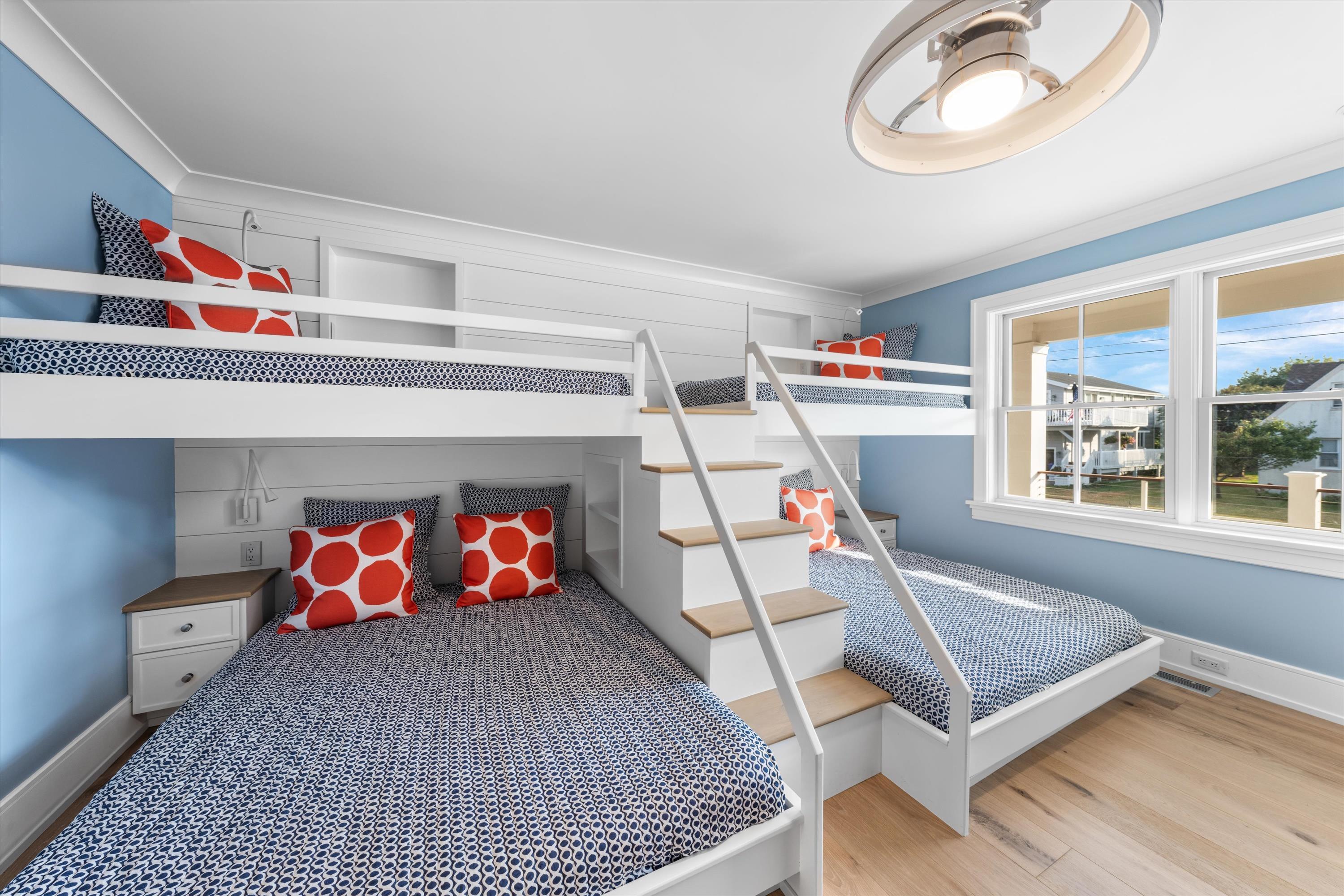 245 57th Street Avalon, NJ 08202 - Photo 27 of 50 a living room with furniture and a flat screen tv