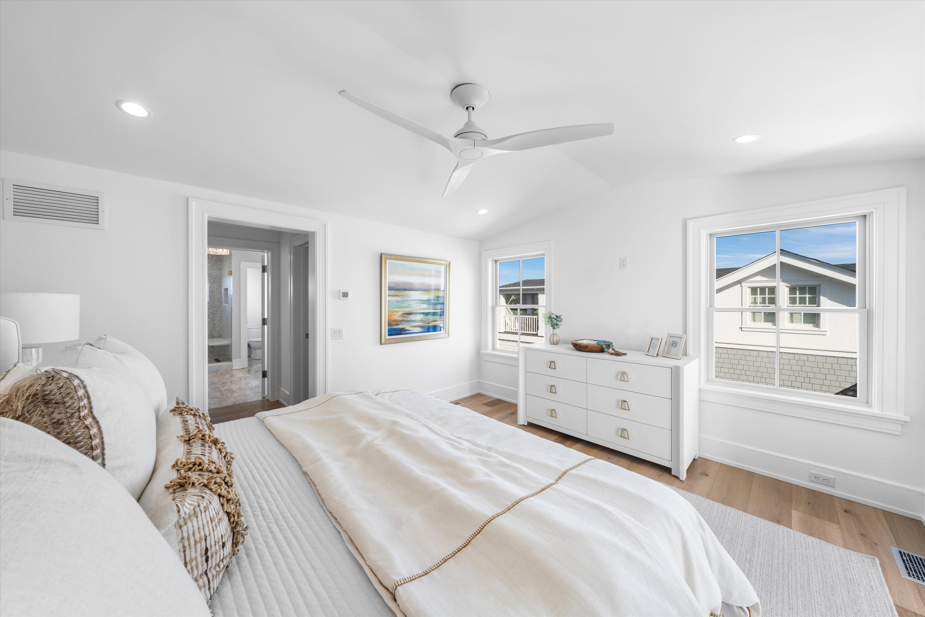 245 57th Street Avalon, NJ 08202 - Photo 35 of 50 a bedroom with a bed and a window