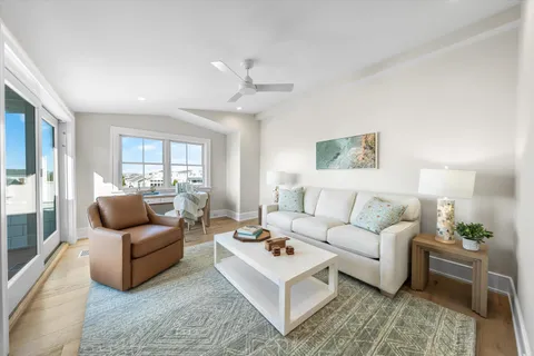 a living room with furniture and a table