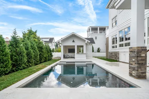 a view of a back yard of the house