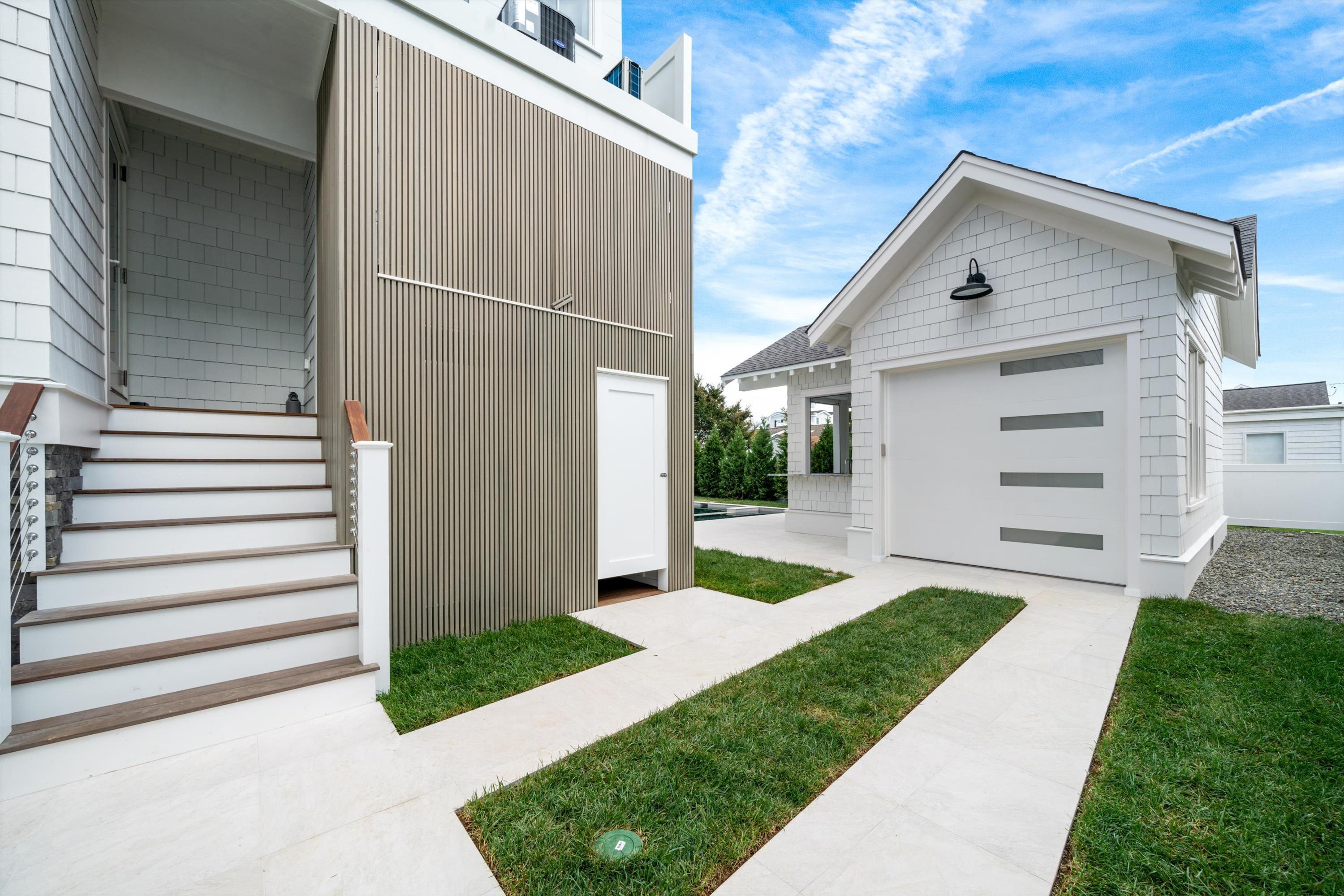 245 57th Street Avalon, NJ 08202 - Photo 47 of 50 a view of a back yard of the house