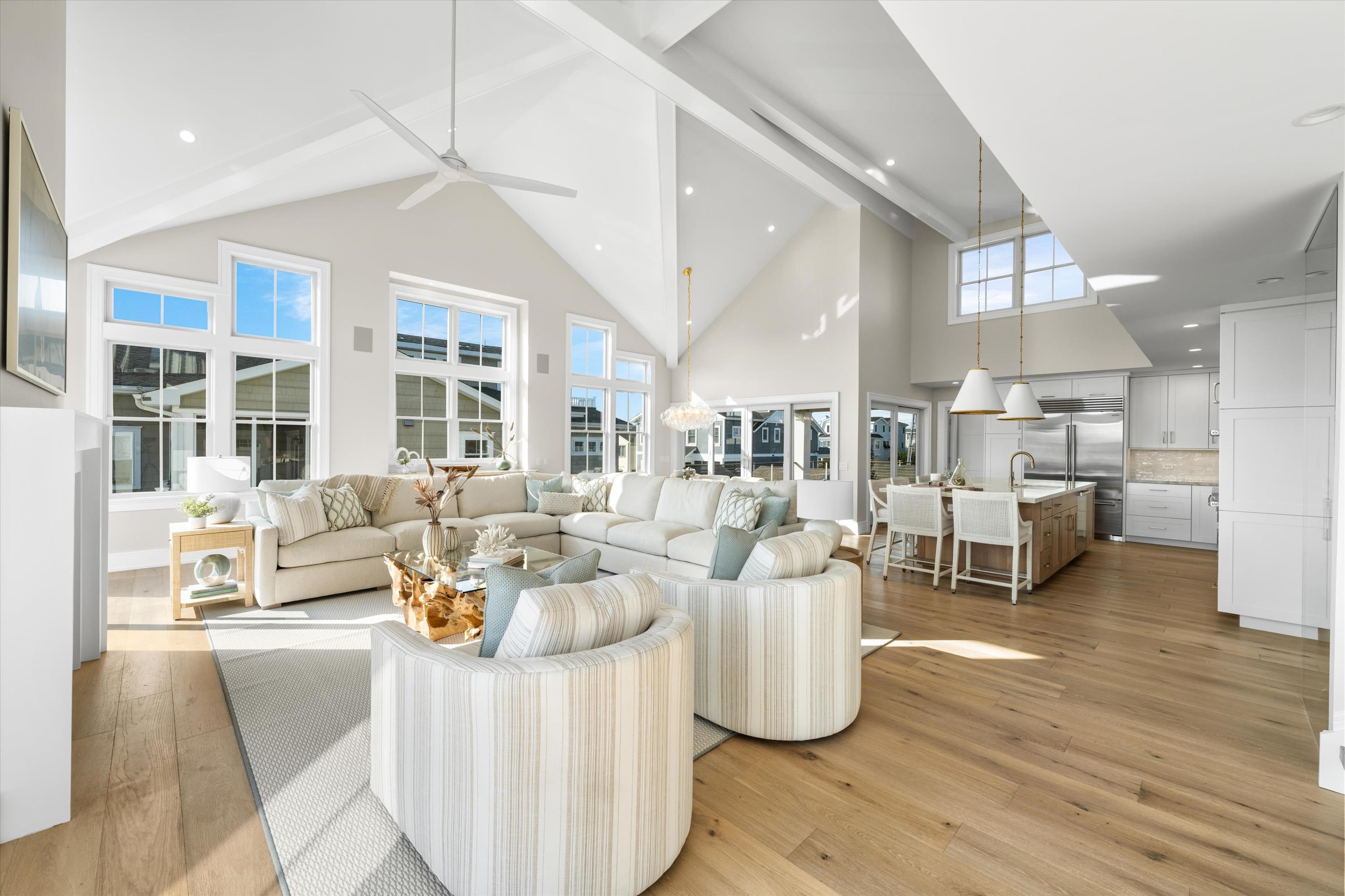 245 57th Street Avalon, NJ 08202 - Photo 5 of 50 a living room with lots of furniture and a wooden floor