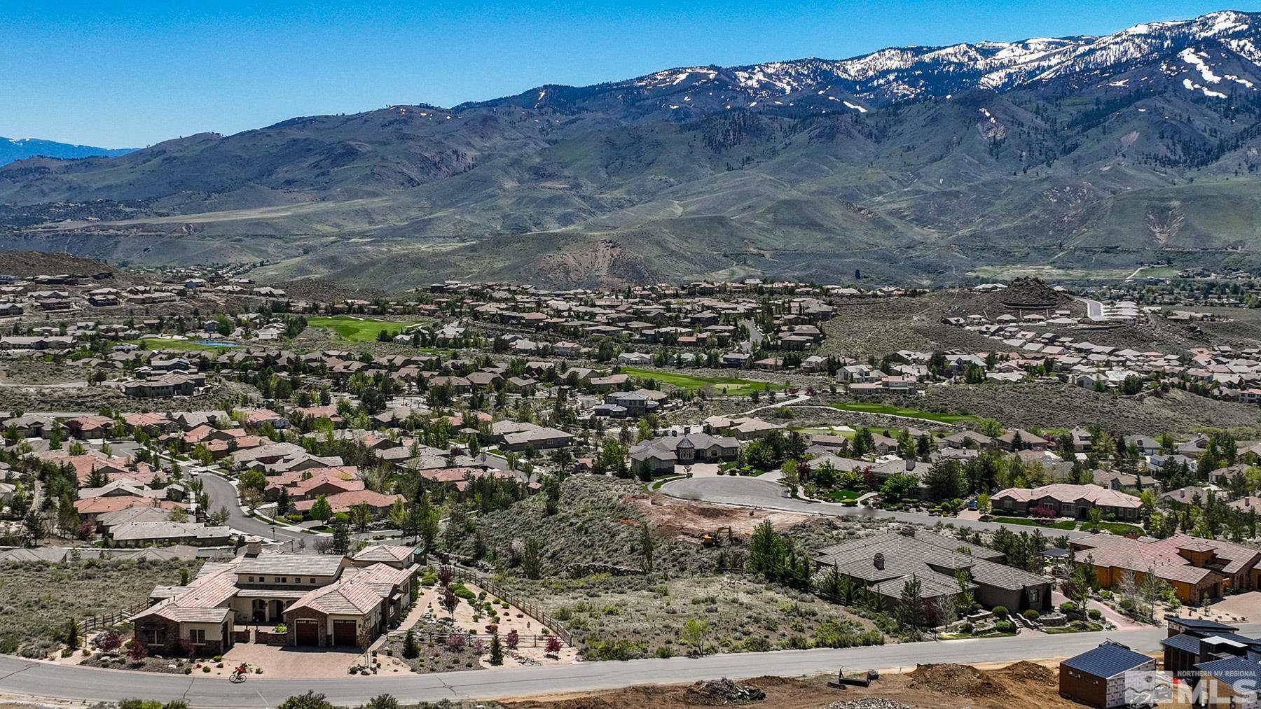 8674 Eagle Chase Trail Reno, NV 89523 - Photo 25 of 40 an aerial view of residential house and sandy dunes