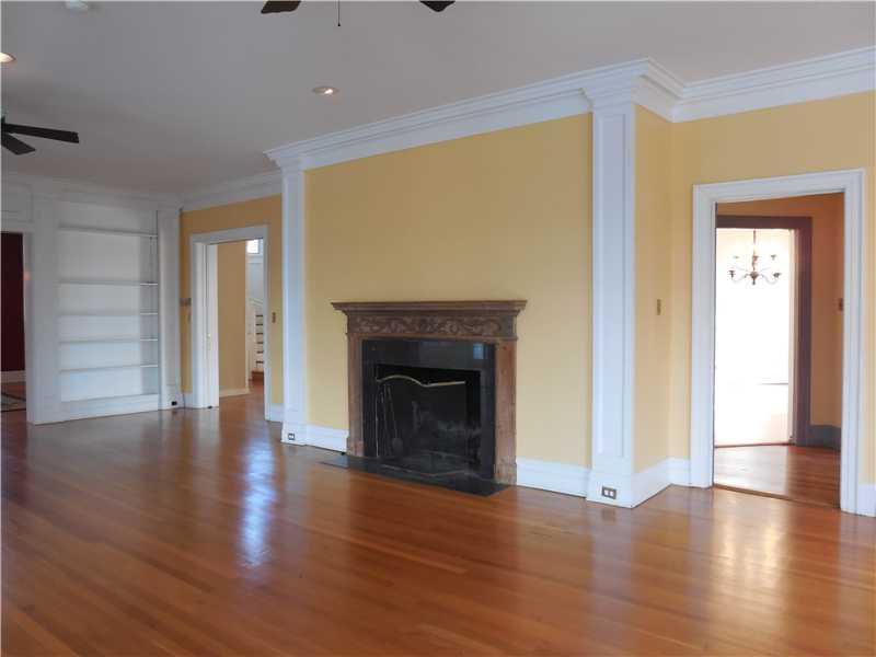 743 Chestnut Road Edgeworth, PA 15143 - Photo 15 of 25 Living Room. The living room is spacious with gleaming floors and a detailed oak mantel. The archways lead to the entry and the dining room and kitchen.