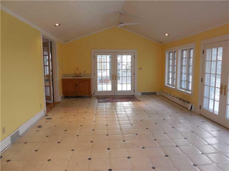 743 Chestnut Road Edgeworth, PA 15143 - Photo 16 of 25 Sunroom. The Sunroom has a ceramic tile floor, bead board ceiling, French doors leading out to the porch and a wet sink..