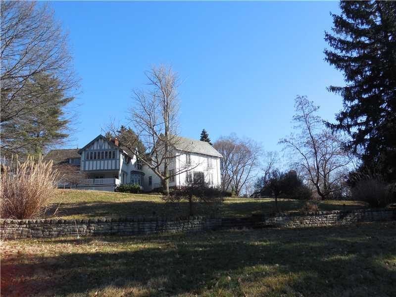 743 Chestnut Road Edgeworth, PA 15143 - Photo 6 of 25 Facade/Exterior Front. Notice the stone wall crossing the property. The house sits high. The property gently slopes. One could put in tennis courts or a pool.