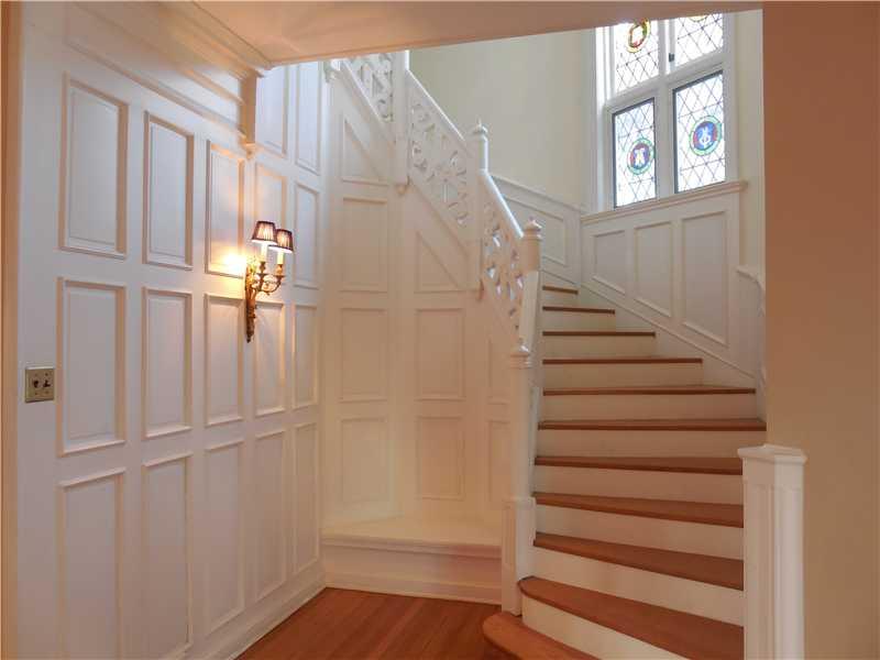 743 Chestnut Road Edgeworth, PA 15143 - Photo 9 of 25 Entry/Foyer. The woodwork is white, the floors are gleaming hardwood and the windows are leaded glass.