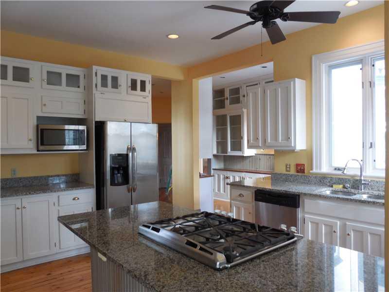 743 Chestnut Road Edgeworth, PA 15143 - Photo 10 of 25 Kitchen. The kitchen has grantie counters, a 6 burner gas cooktop, stainless dishwasher, microwave and fridge.