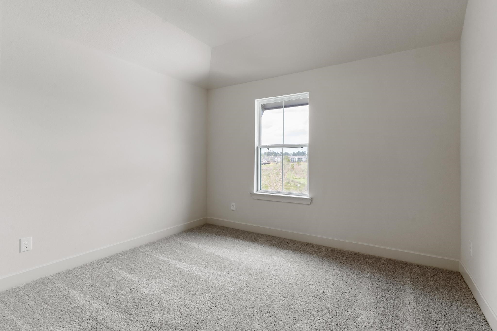 407 Mathis Lk Court Conroe, TX 77304 - Photo 20 of 26 Upstairs Bedroom #5