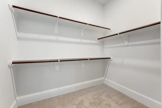 a view of an empty walk in closet