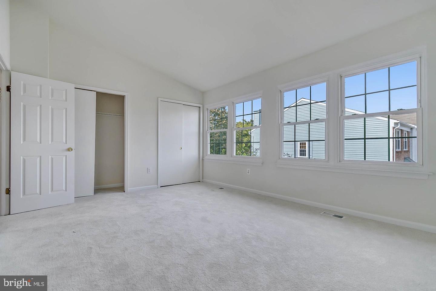 12110 Sweet Clover Drive Silver Spring, MD 20904 - Photo 11 of 13 an empty room with windows