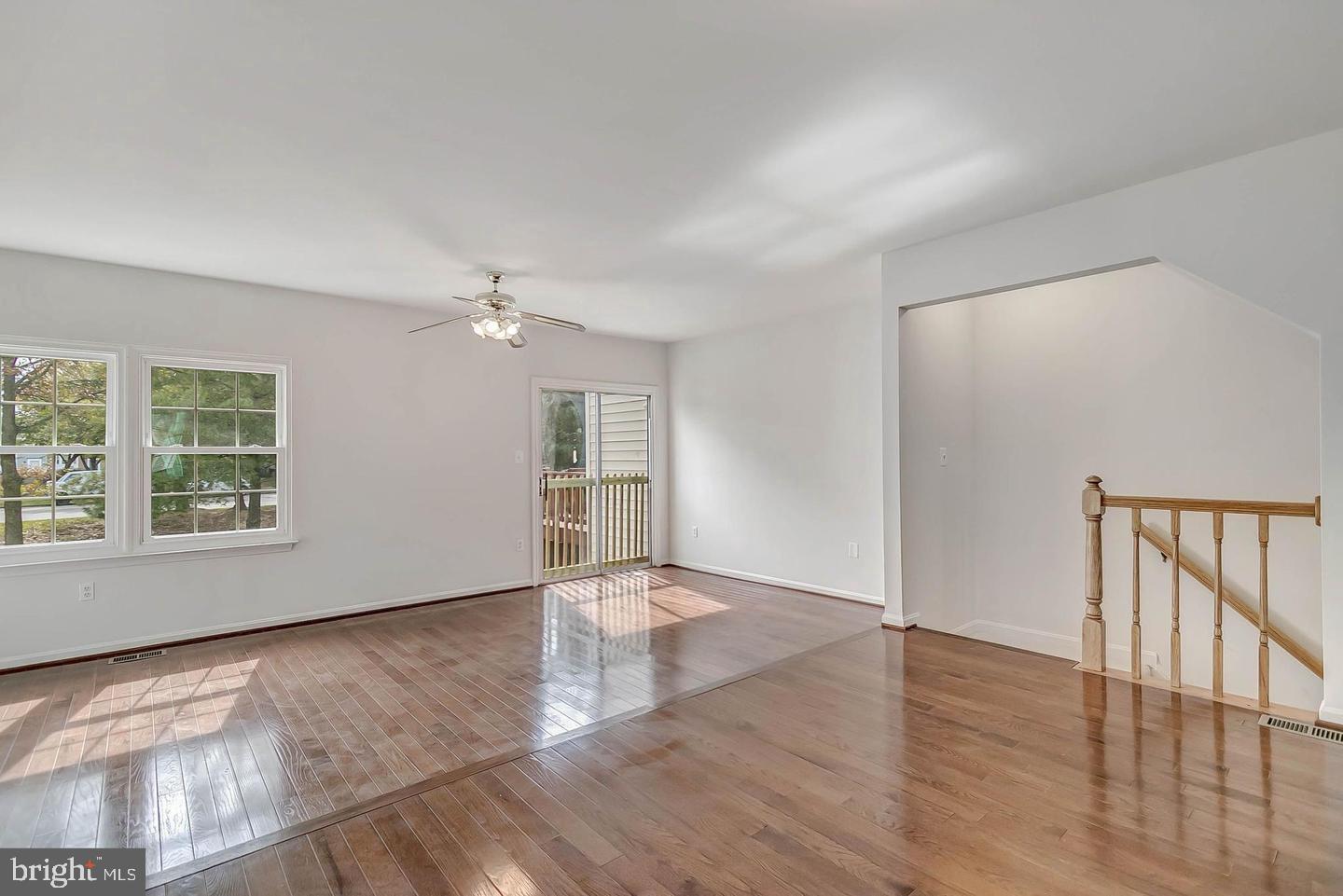 12110 Sweet Clover Drive Silver Spring, MD 20904 - Photo 3 of 13 wooden floor in an empty room with a window