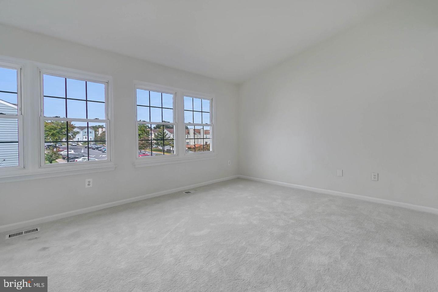 12110 Sweet Clover Drive Silver Spring, MD 20904 - Photo 7 of 13 an empty room with windows