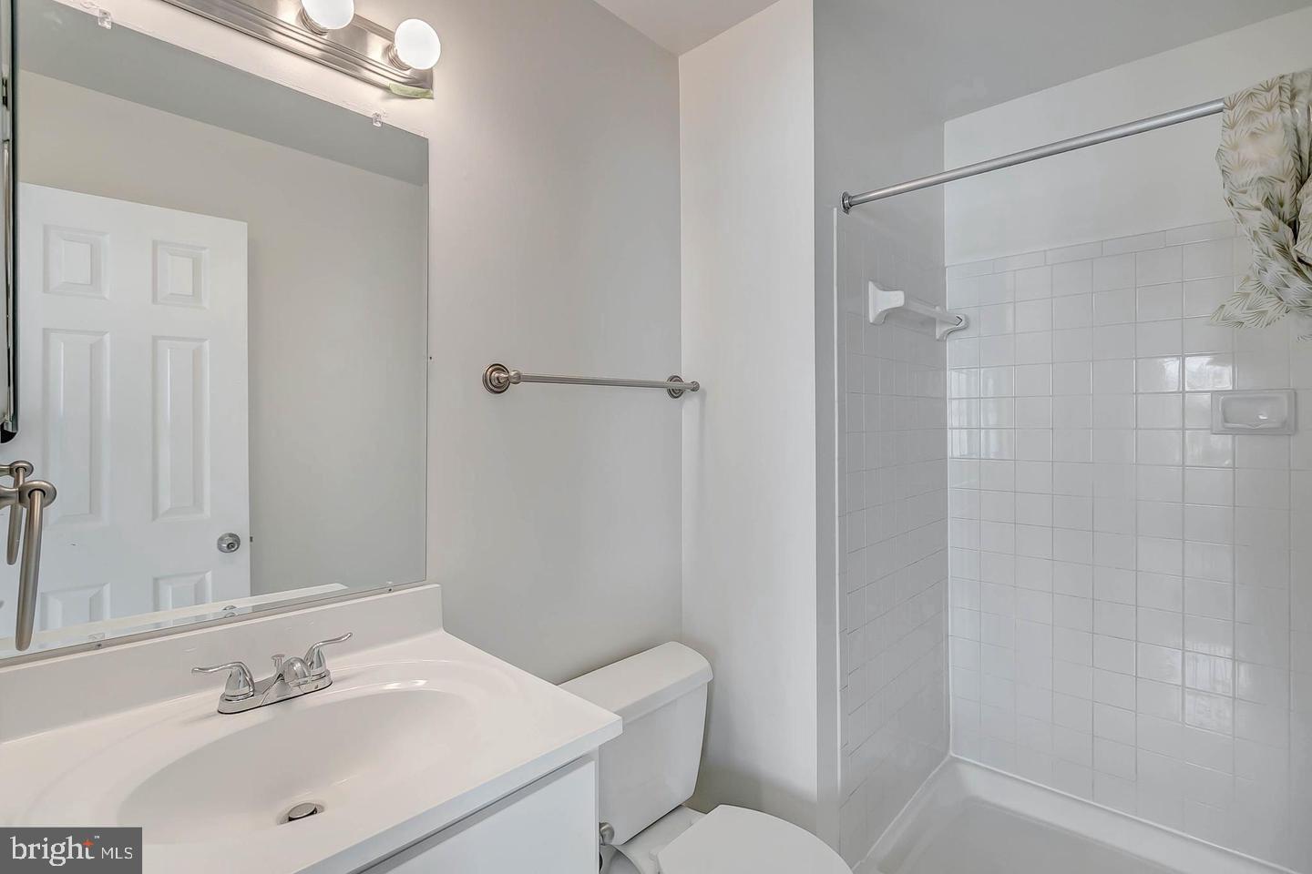 12110 Sweet Clover Drive Silver Spring, MD 20904 - Photo 10 of 13 a bathroom with a sink toilet and shower