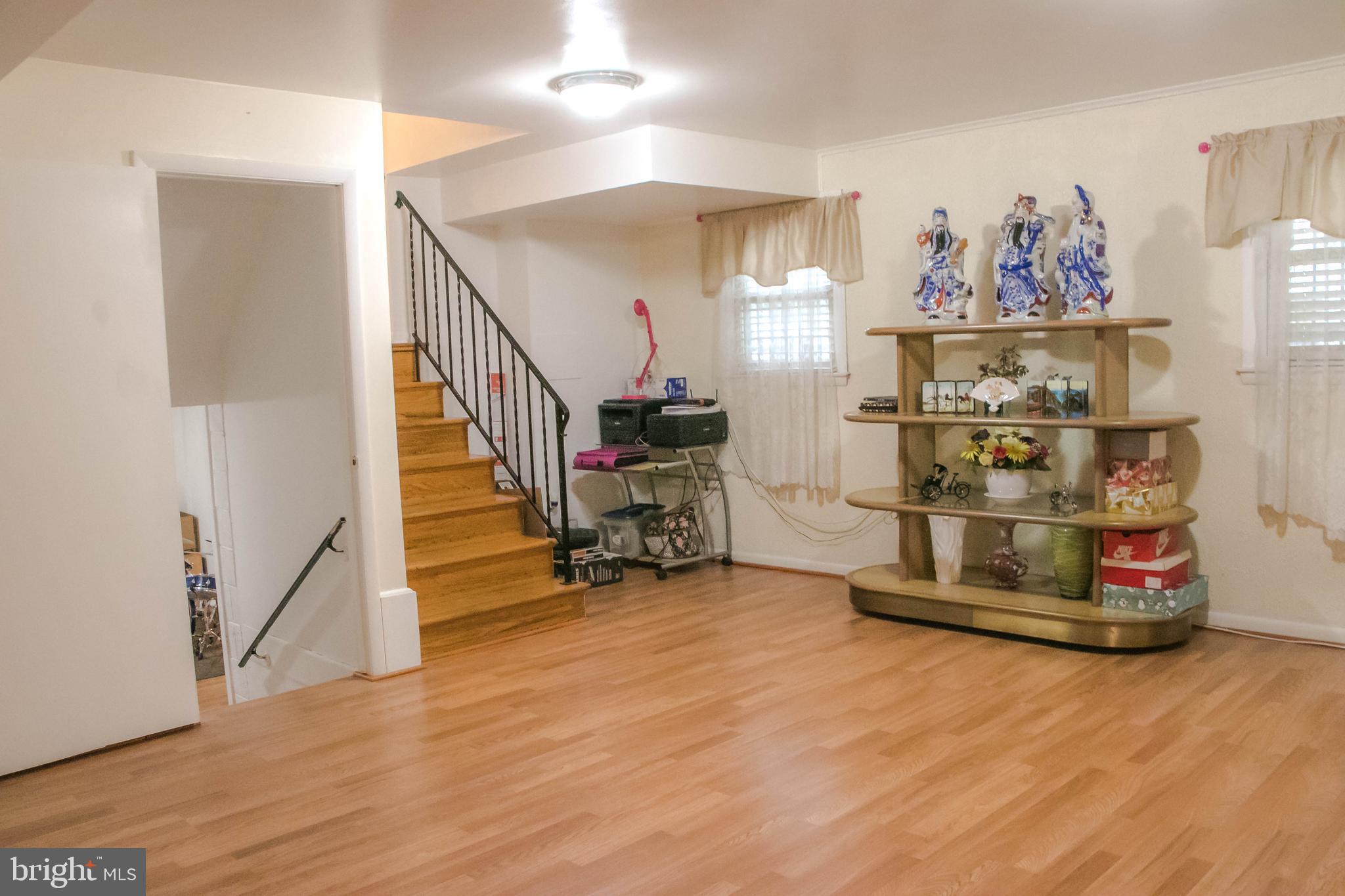 4212 Kinmount Road Lanham, MD 20706 - Photo 11 of 24 WALK DOWN TO SPLIT LEVEL OF THE HOMEWALK DOWN TO S