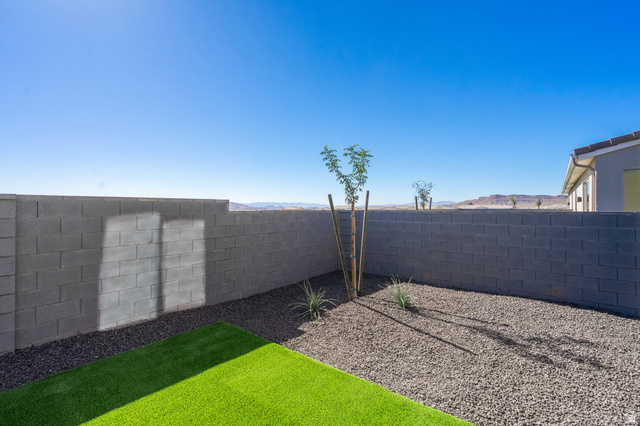 2972 West 570 North Hurricane, UT 84737 - Photo 84 of 104 Fenced backyard with a mountain view