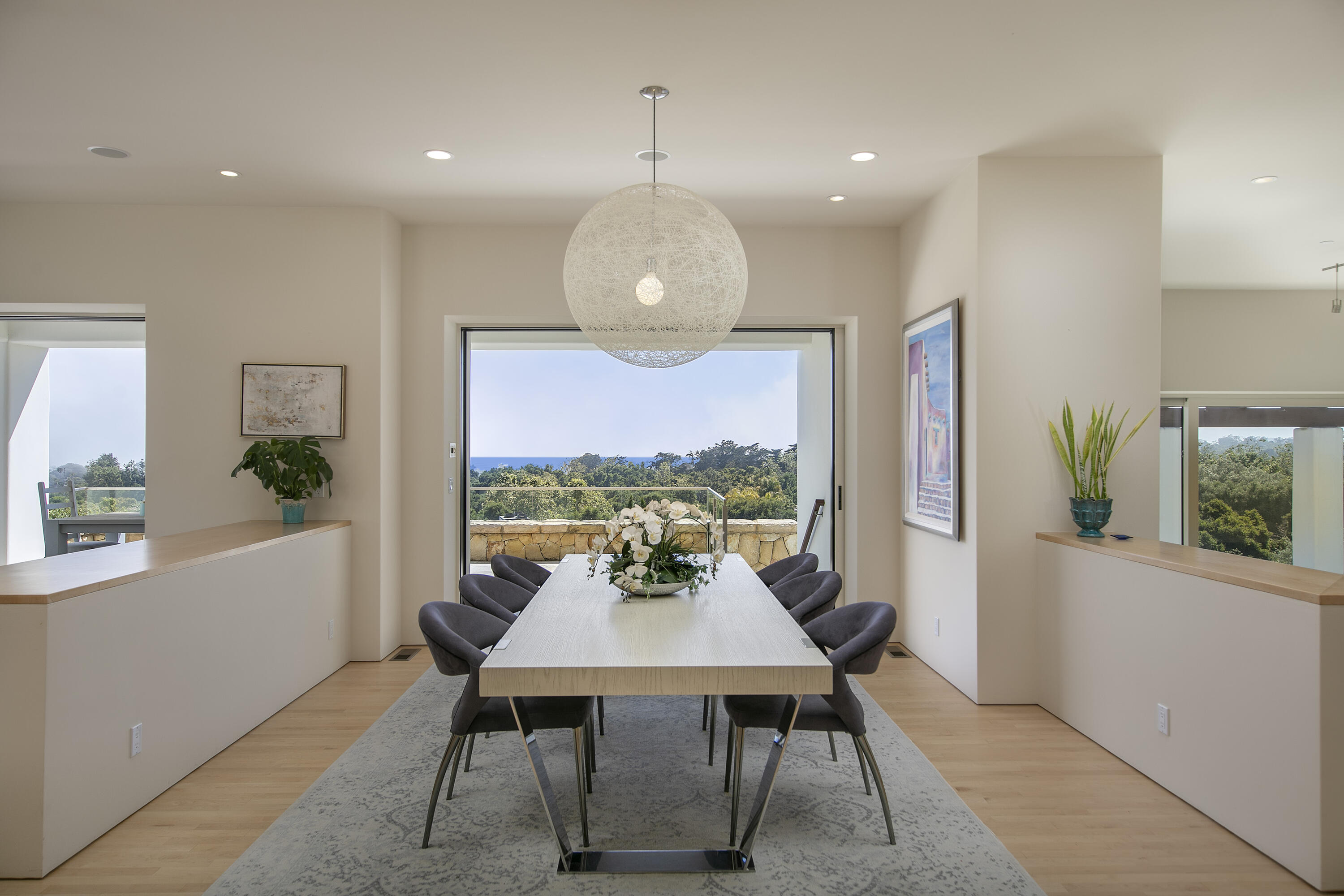 303 Meadowbrook Drive Santa Barbara, CA 93108 - Photo 11 of 28 a view of a dining room with furniture window and wooden floor