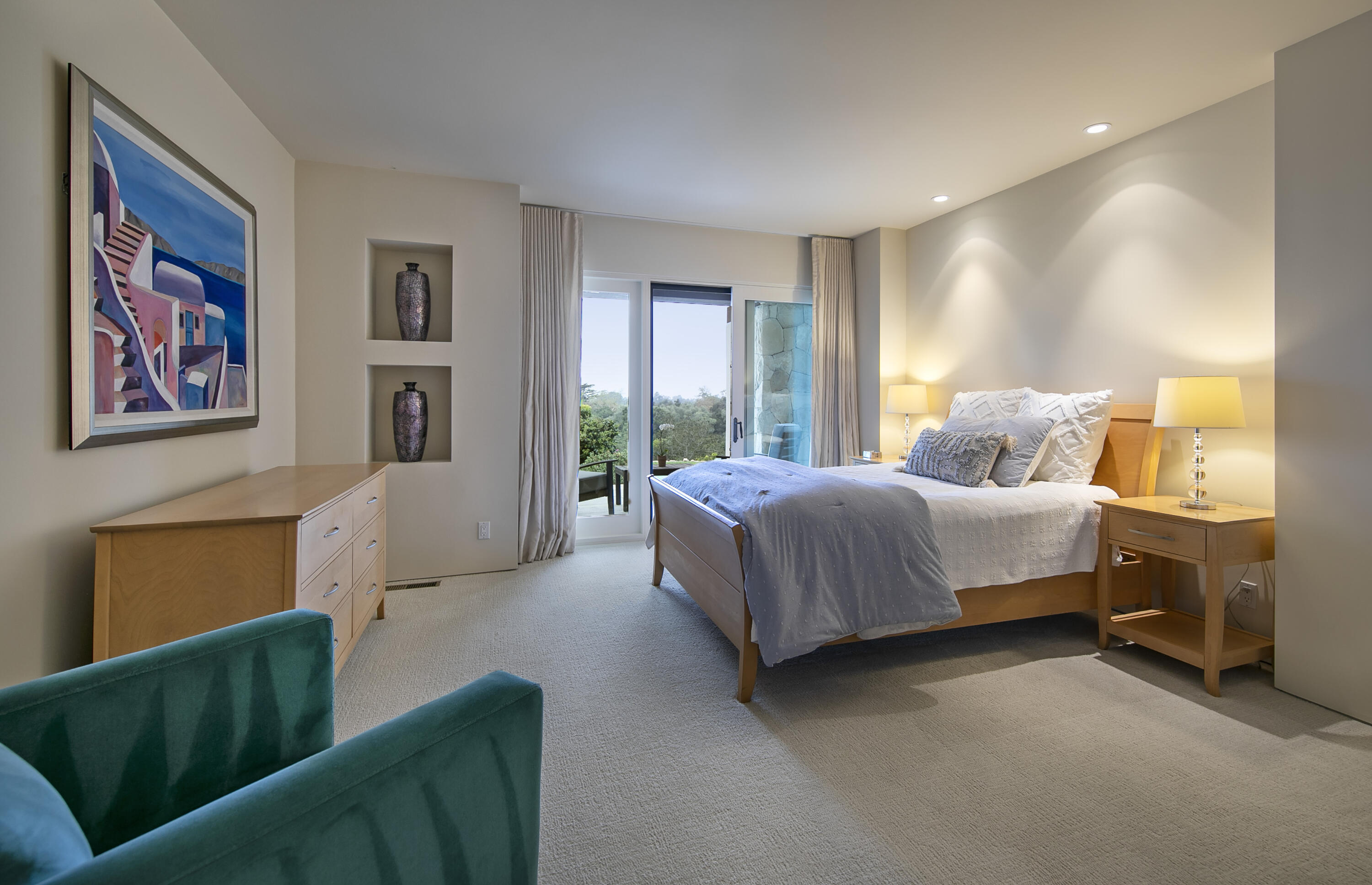 303 Meadowbrook Drive Santa Barbara, CA 93108 - Photo 15 of 28 a spacious bedroom with a bed and a couch