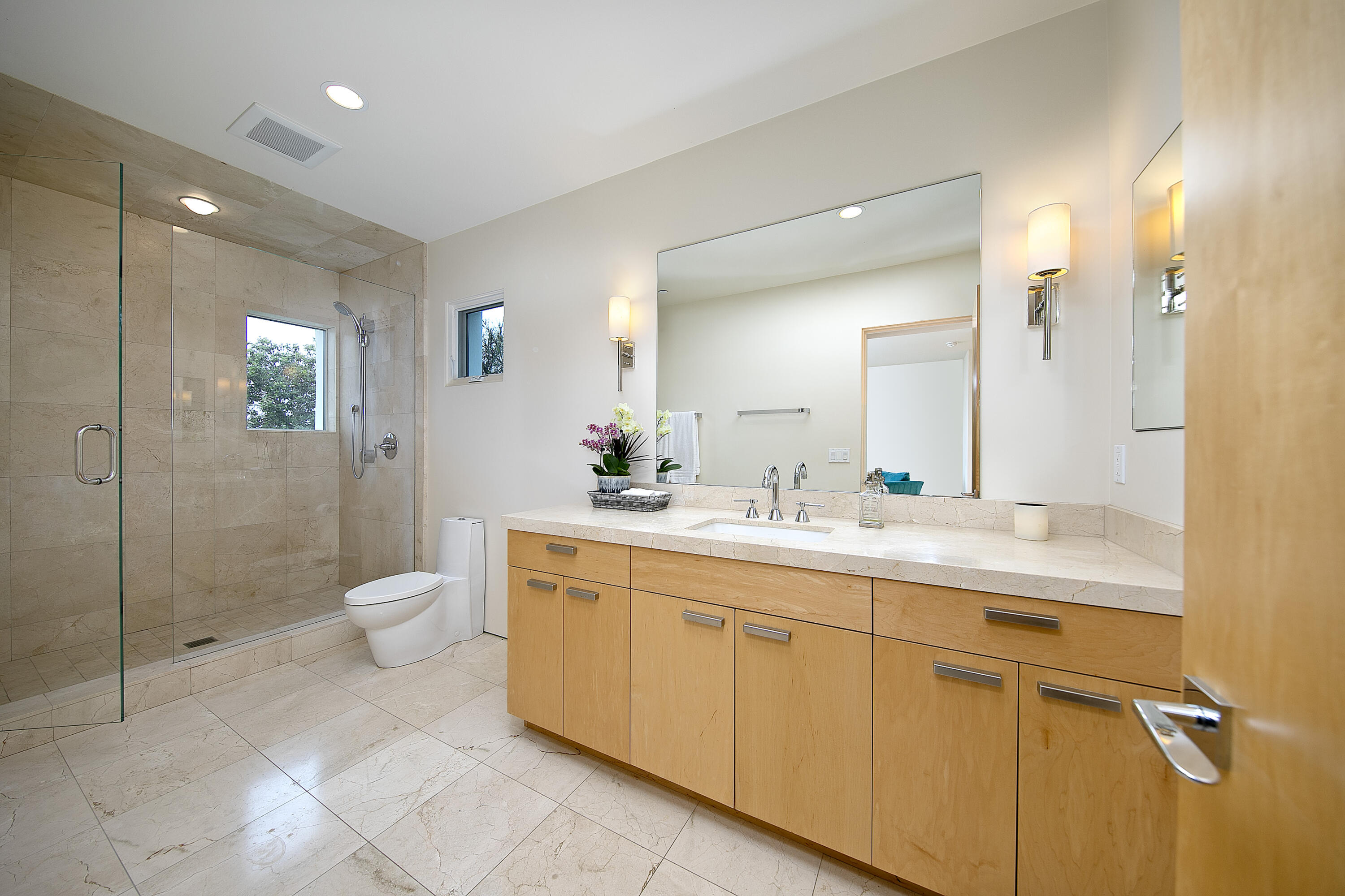 303 Meadowbrook Drive Santa Barbara, CA 93108 - Photo 16 of 28 a bathroom with a toilet sink and shower