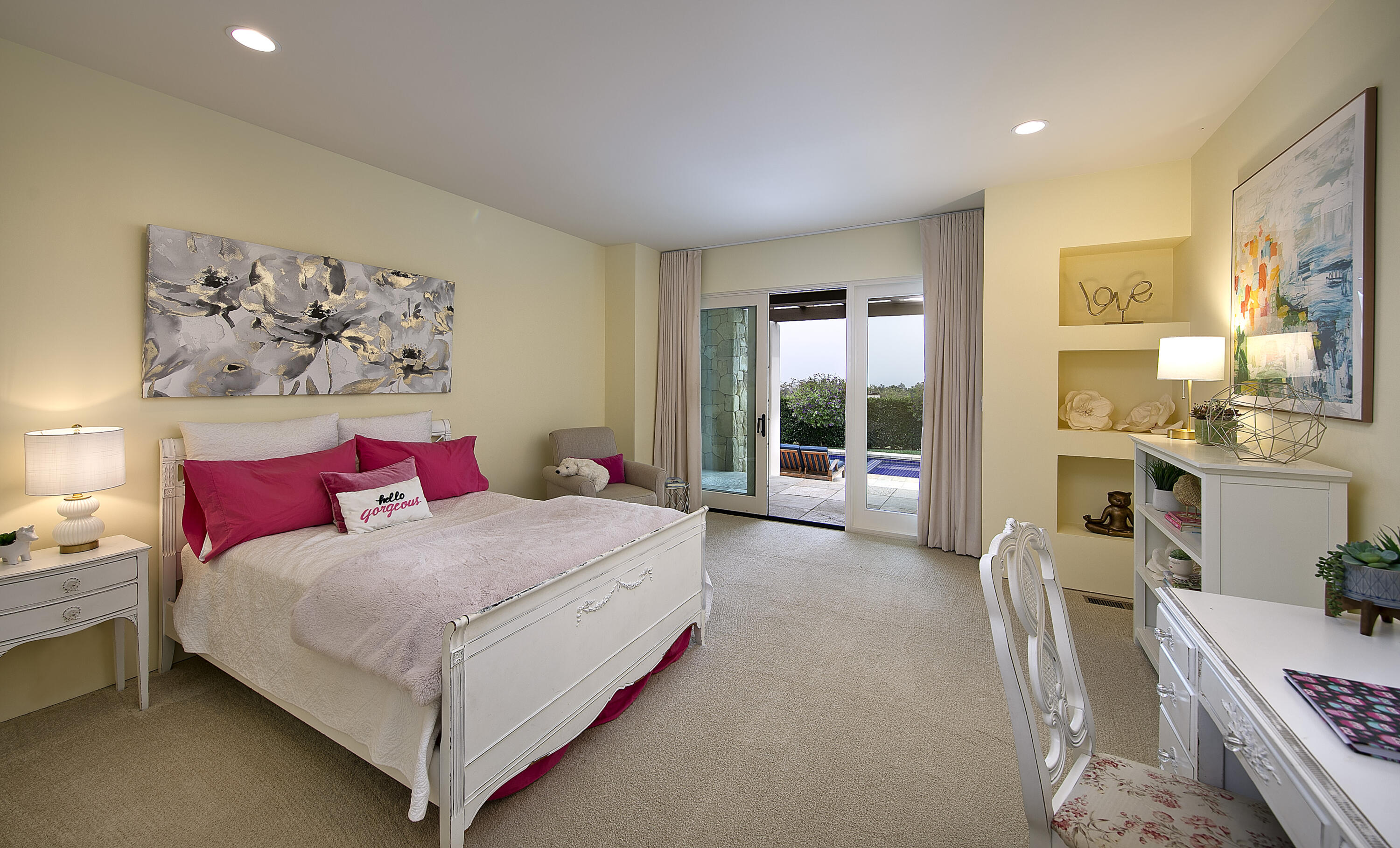 303 Meadowbrook Drive Santa Barbara, CA 93108 - Photo 17 of 28 a bedroom with a large bed and a couch