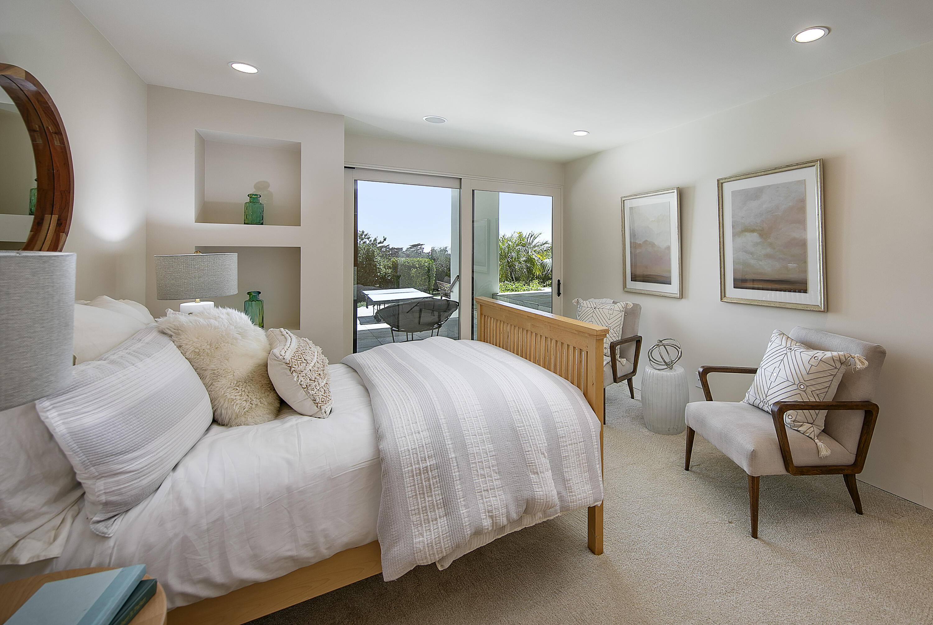 303 Meadowbrook Drive Santa Barbara, CA 93108 - Photo 20 of 28 a bedroom with a bed and a couch