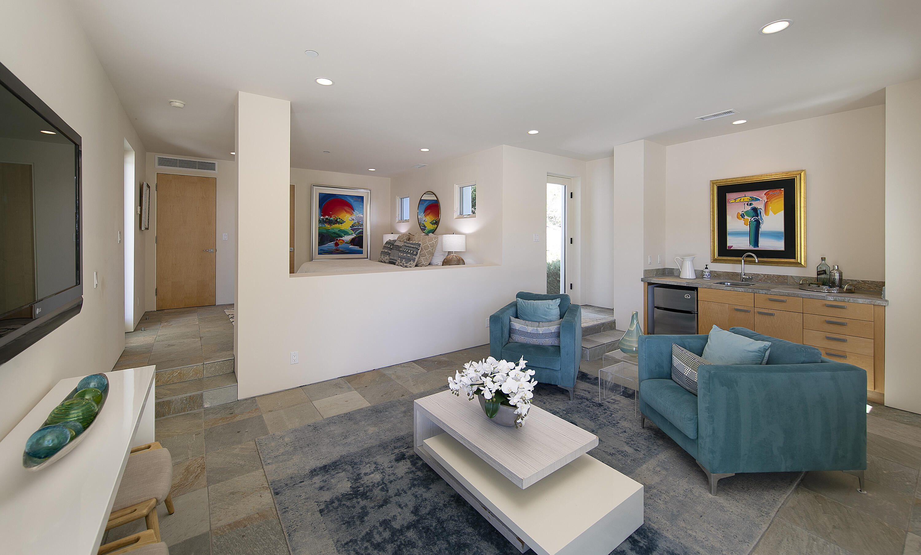 303 Meadowbrook Drive Santa Barbara, CA 93108 - Photo 23 of 28 a living room with furniture and a flat screen tv