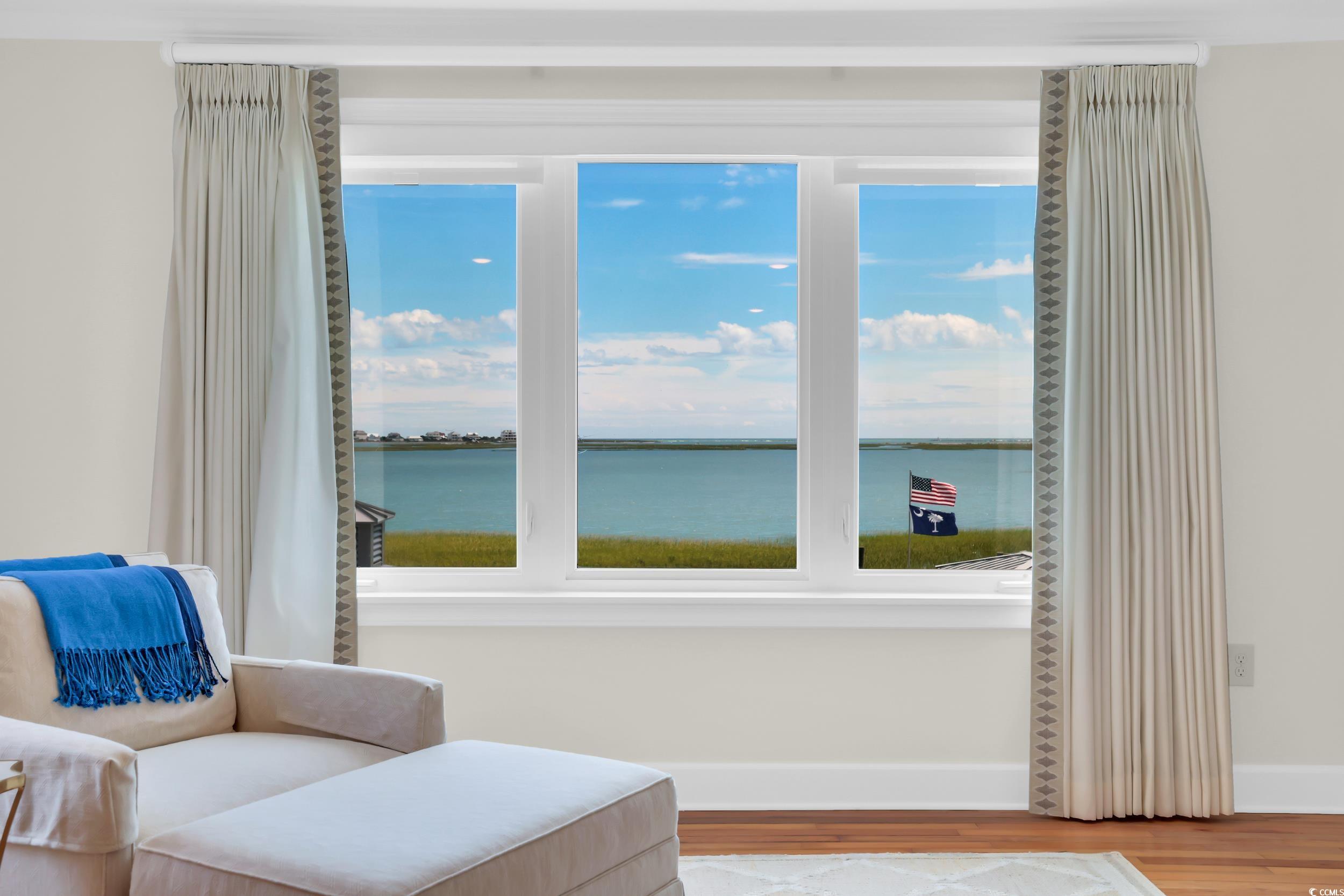 4853 Highway 17 Business Murrells Inlet, SC 29576 - Photo 25 of 40 Living area with a water view and light wood-style floors