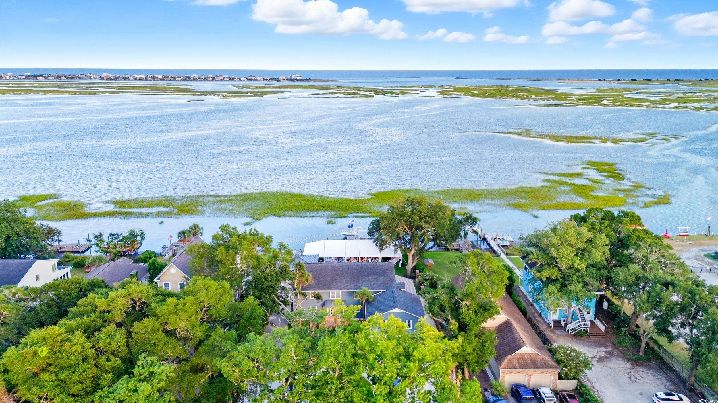 4853 Highway 17 Business Murrells Inlet, SC 29576 - Photo 40 of 40 Aerial perspective of suburban area with a nearby body of water