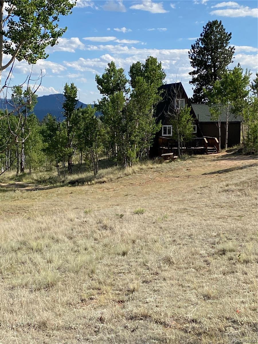 259 Bordenville Road Jefferson, CO 80456 - Photo 15 of 47 a front view of a house with a yard