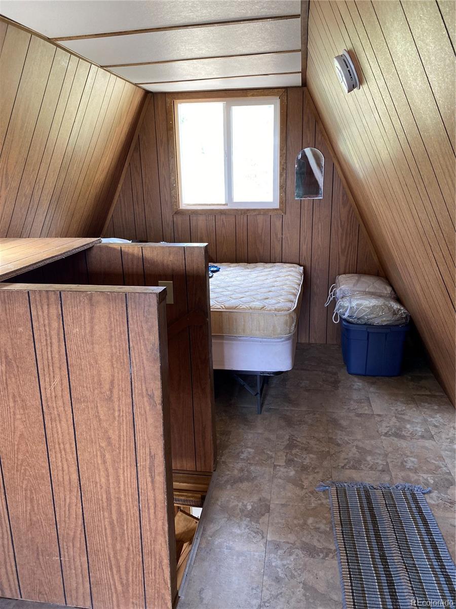 259 Bordenville Road Jefferson, CO 80456 - Photo 28 of 47 a living room with furniture and a window