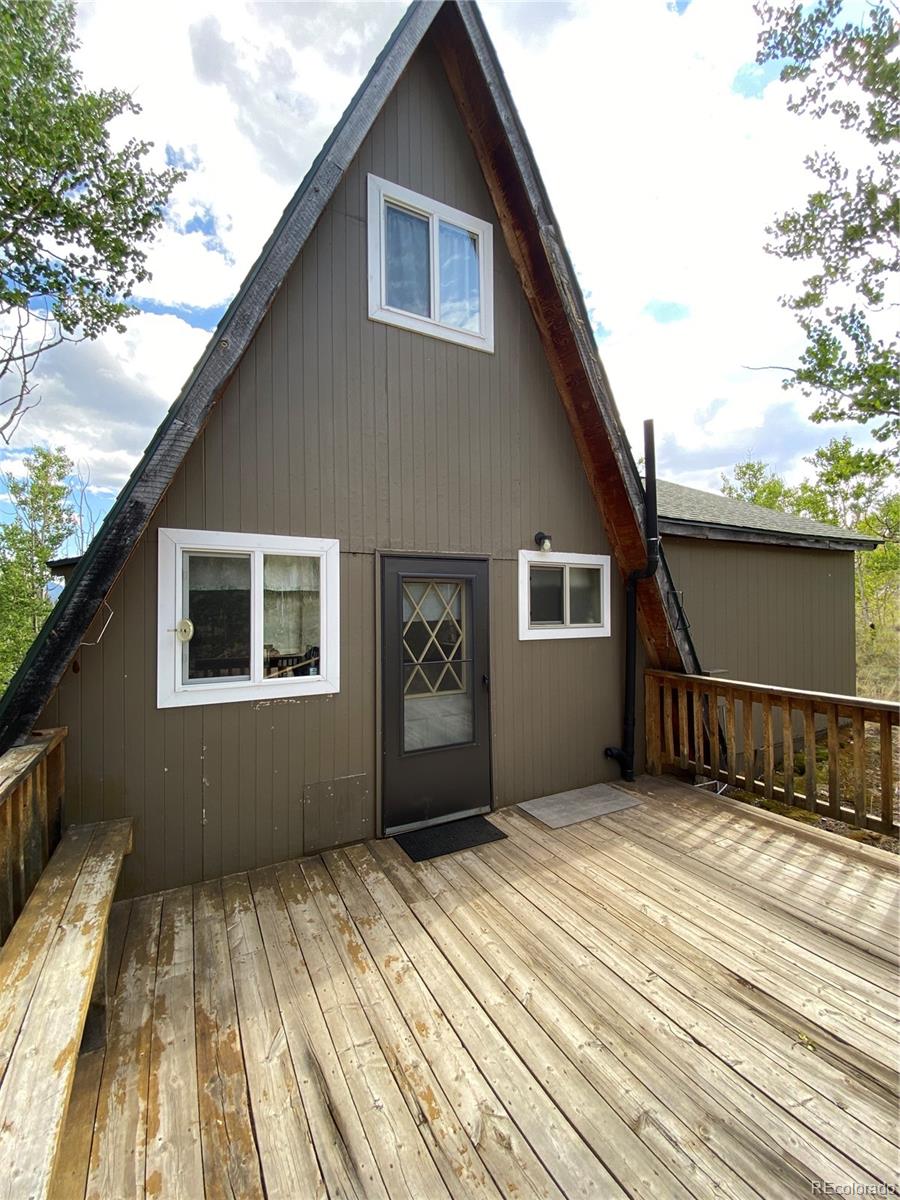 259 Bordenville Road Jefferson, CO 80456 - Photo 8 of 47 a house with trees in the background
