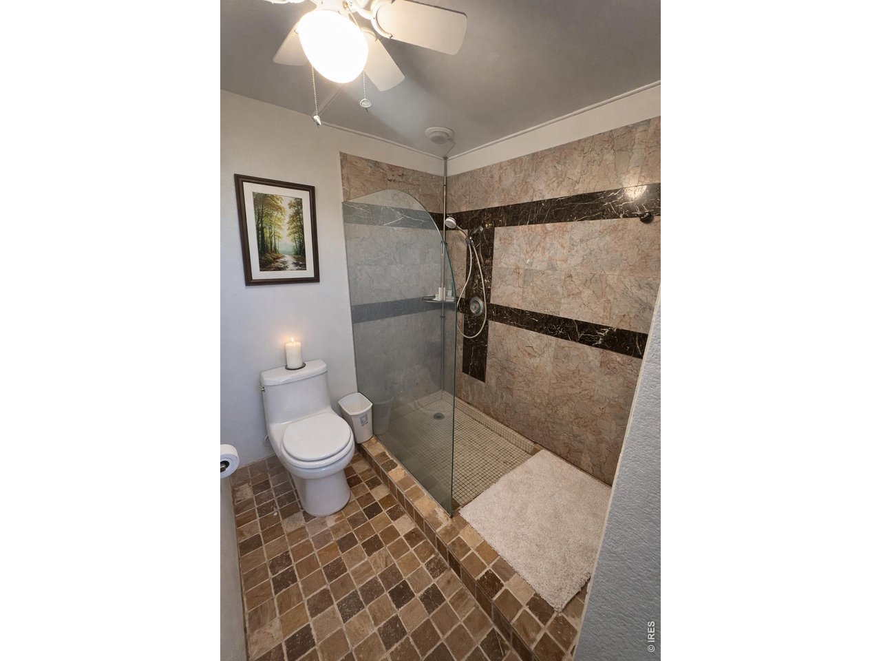 5588 Pioneer Road Boulder, CO 80301 - Photo 11 of 11 a bathroom with a toilet and a shower