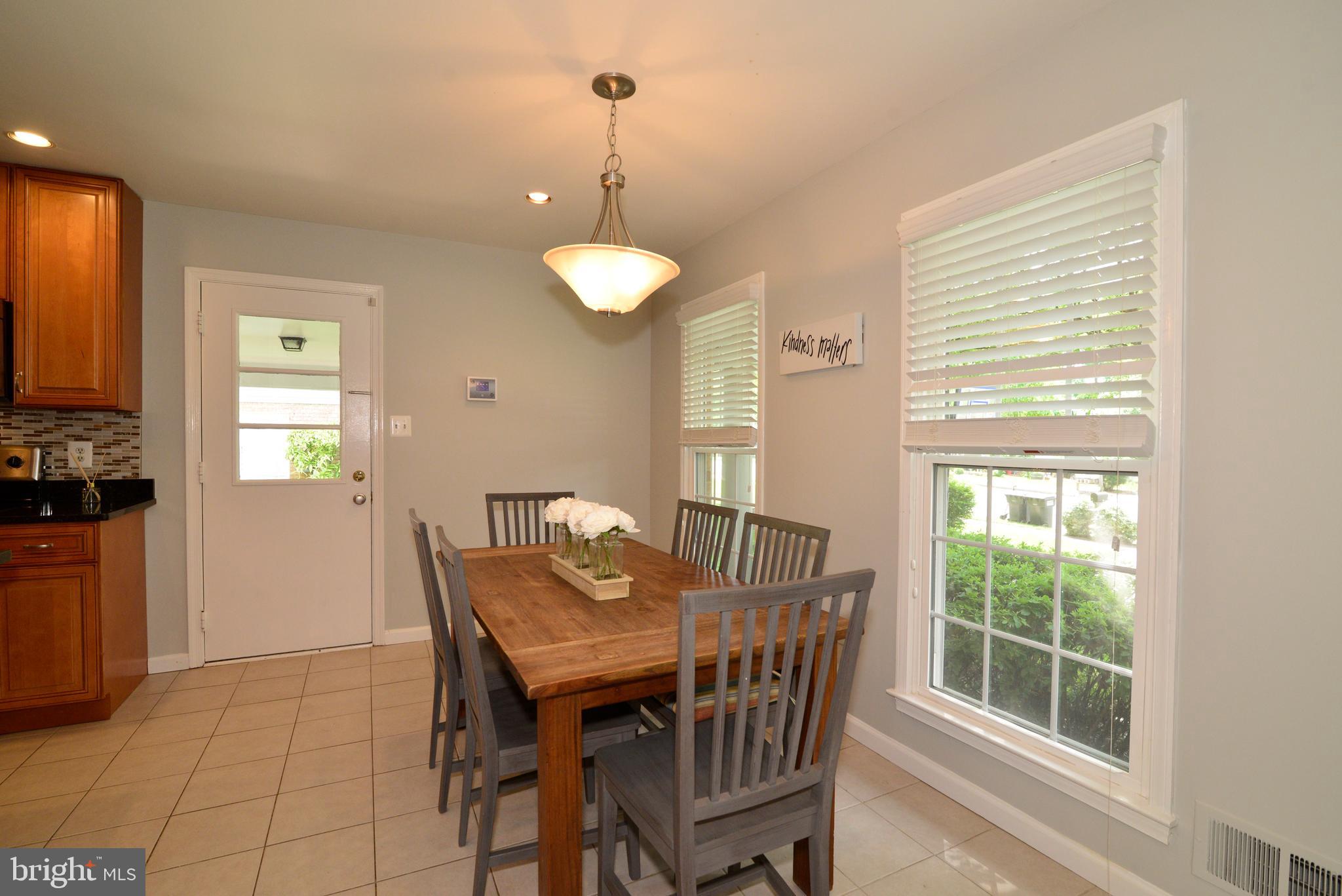 1501 Coat Ridge Road Herndon, VA 20170 - Photo 4 of 29 Breakfast Nook with Wall of Windows.