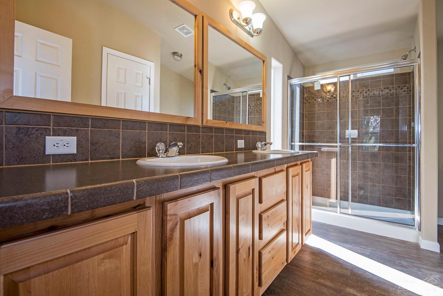 19770 Buck Canyon Road Bend, OR 97702 - Photo 14 of 23 The master bath enjoys an extra long van